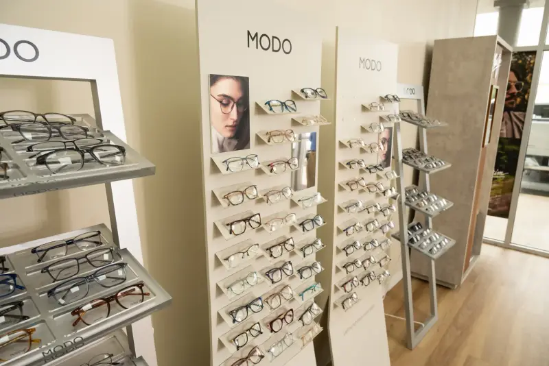 Close view of the MODO wall display filled with eyeglass frames